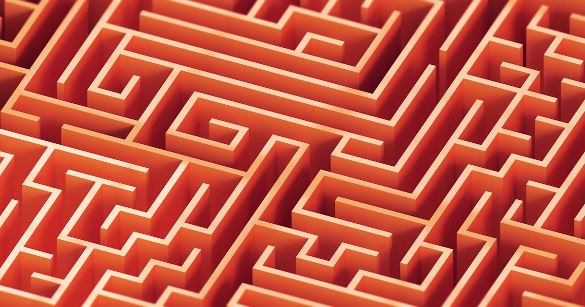 An intricate orange 3D maze viewed from above: the paths an agent wanders while figuring out an unfamiliar API.